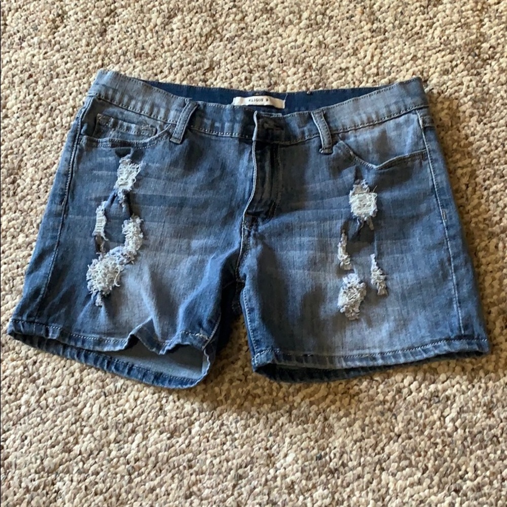 Distressed denim shorts